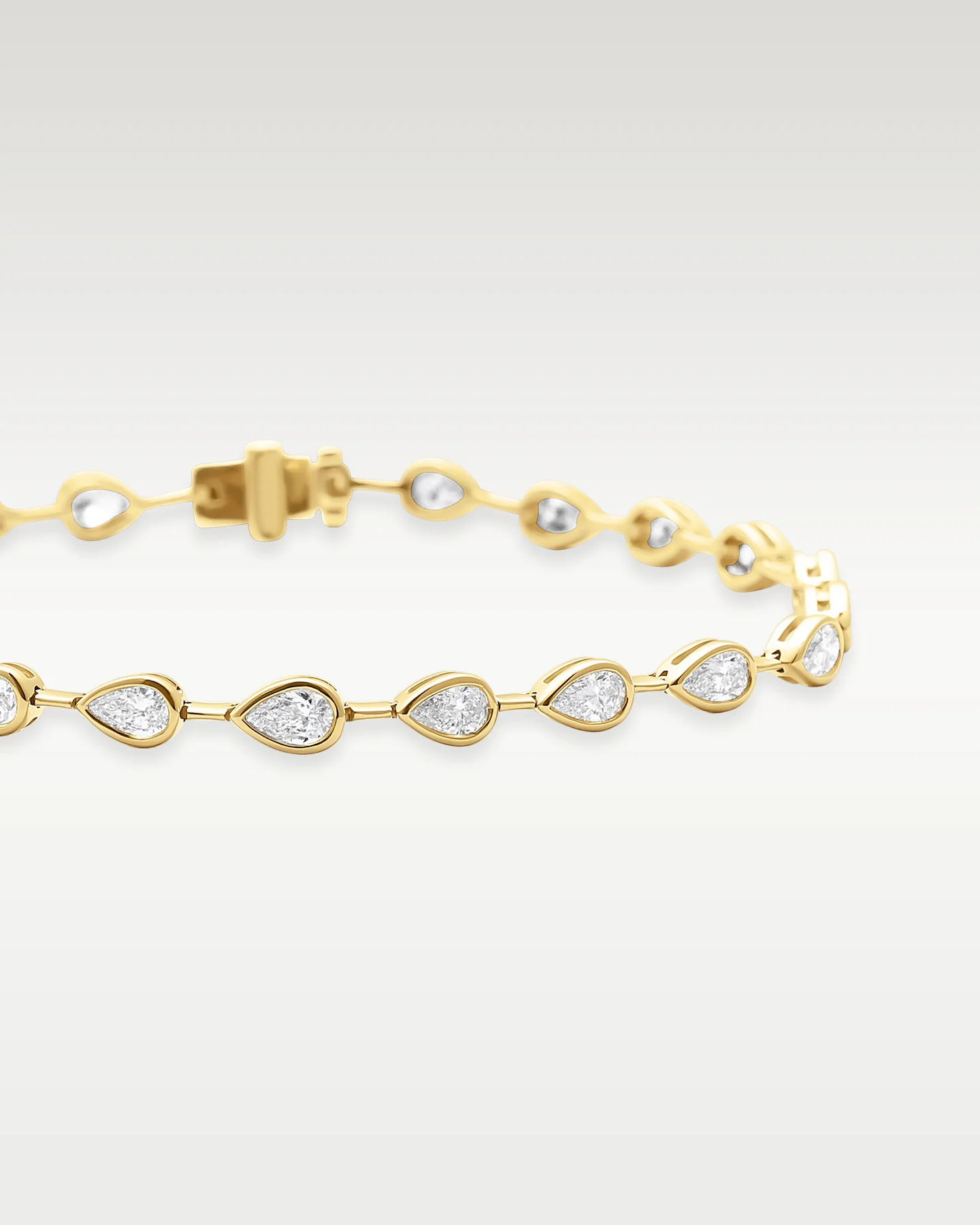 Yellow Gold Bezel Pear Diamond Tennis Bracelet - Image 2